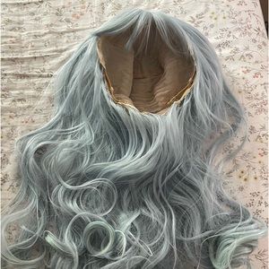 Faux pastel blue wig with wispy bangs